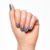 A close up fair skin model's nail shot wearing Salon Perfect Nail Lacquer .5oz 408 Vacation Mode.